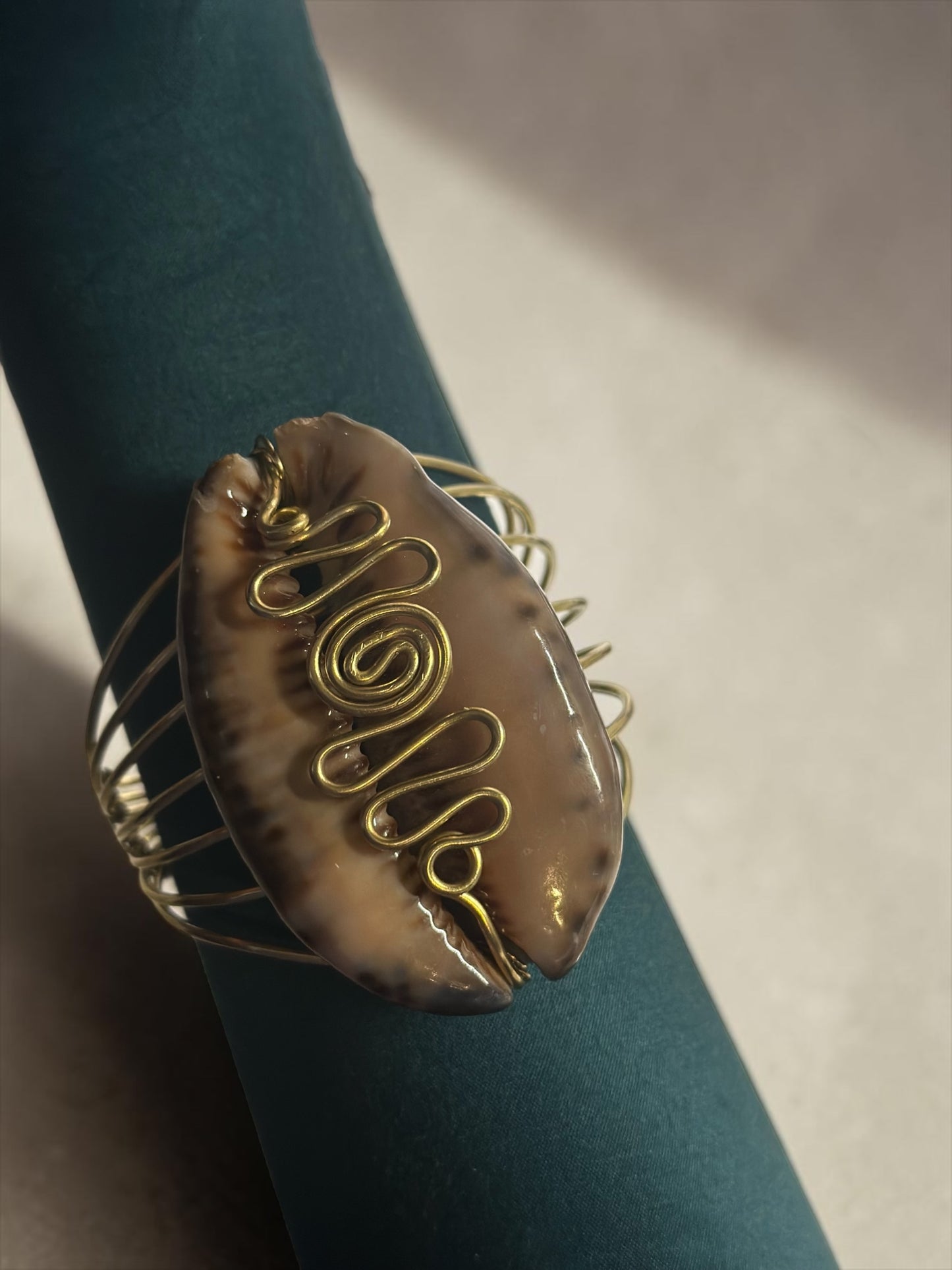 Wealth Within Brass Cowrie Cuff