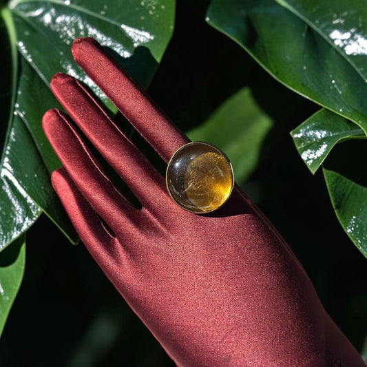 The Light That Lives Within Brass Ring — Golden Amber
