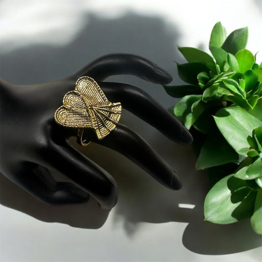 The Queen’s Fan: Regal Brass Statement Ring